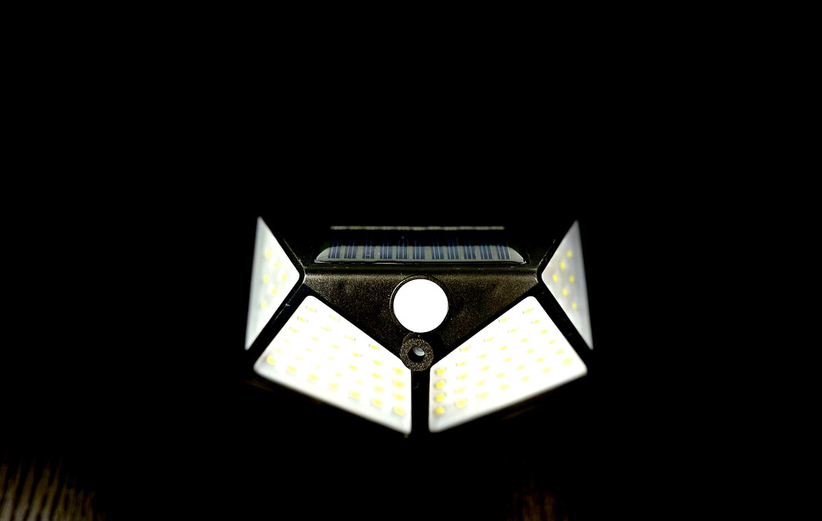 solar motion-sensor light mounted beside an RV door