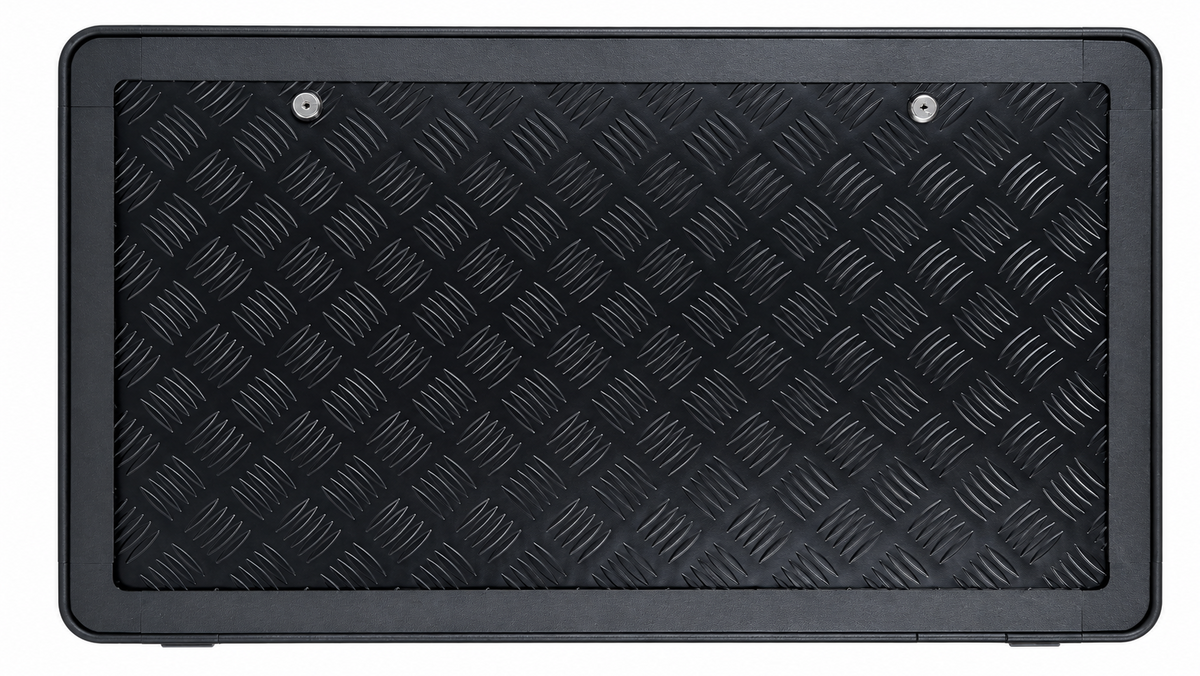 Diamond-plate aluminum fold-down table mounted on a camper wall