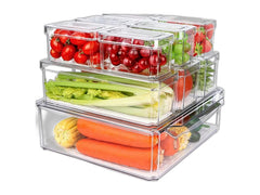 Clear fridge organizer bins with lids stacked