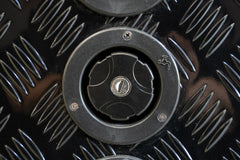 Black Series OEM water inlet installed on checker plate camper panel