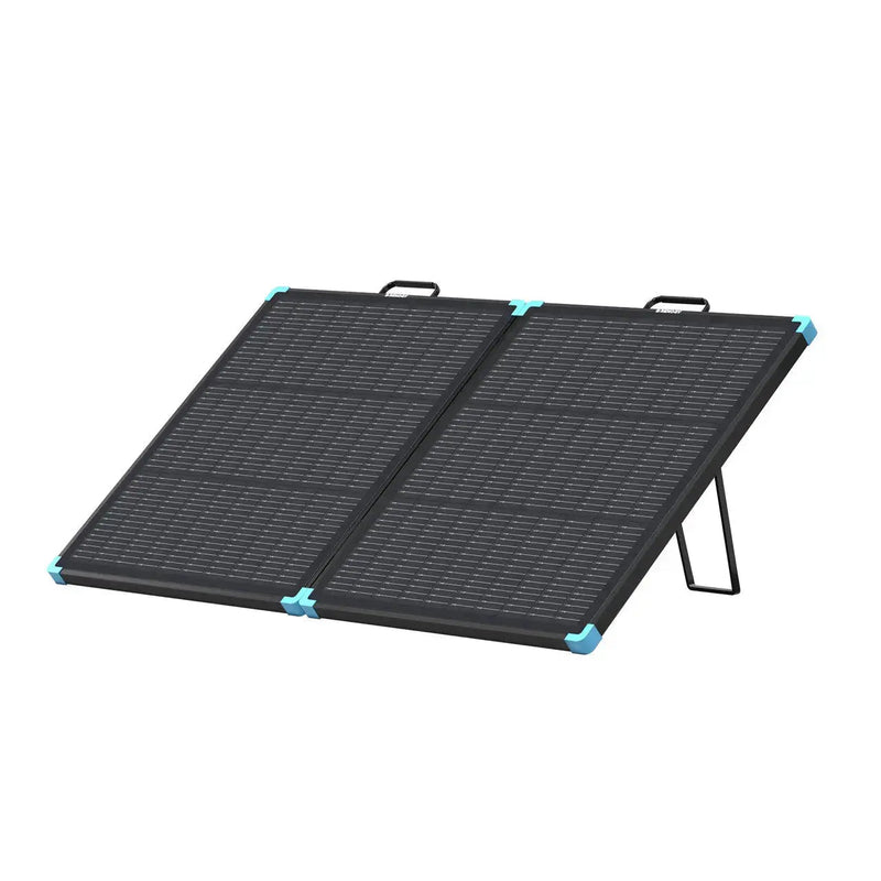 Renogy N-type portable solar panel suitcase open on the ground