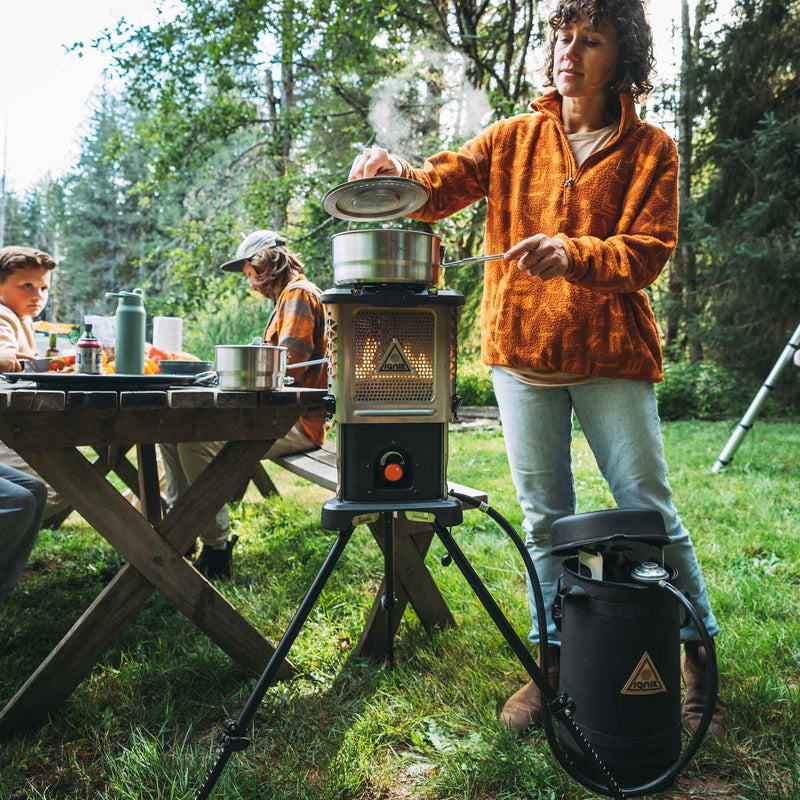 Ignik Skullet Deluxe heater stove with legs and cast-iron skillet