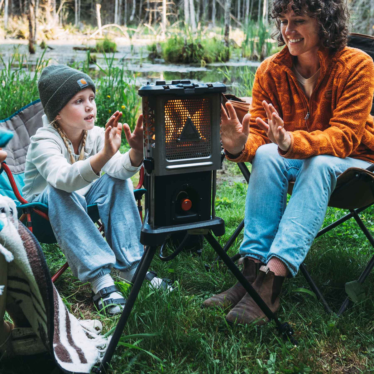 Ignik Skullet Deluxe heater stove with legs and cast-iron skillet