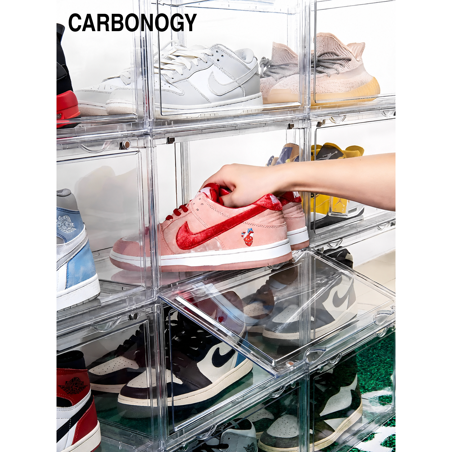 hand opening magnetic drawer front of clear shoe storage box